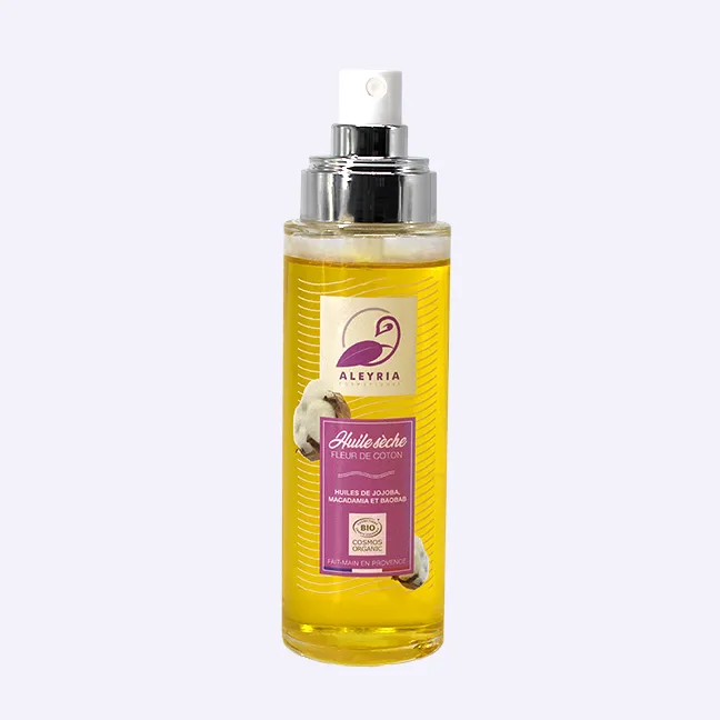 Un flacon d'huile sèche parfum fleur de coton